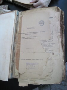Closeup of volume of paper records from El Salvador